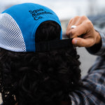 Man wearing adventure hat from Squak Mountain Co. that goes well with micro grid fleece hoodie.