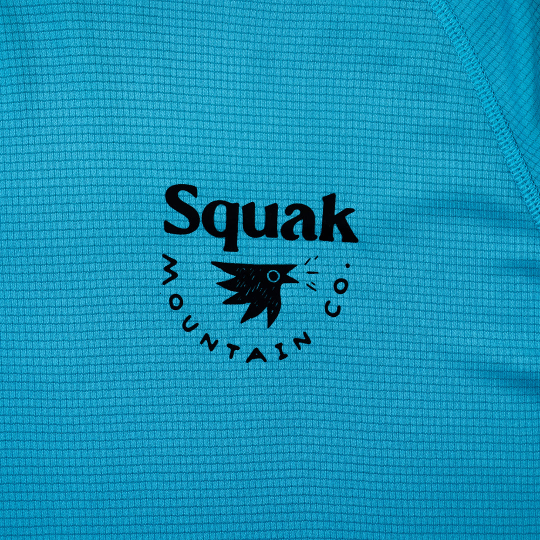 Logo on chest on aqua blue outdoor sun hoodie from Squak Mountain Co.