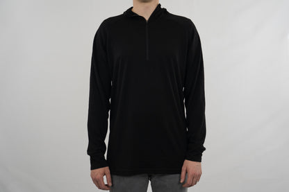 Person wearing black wool base layer hoodie from Squak Mountain Co.