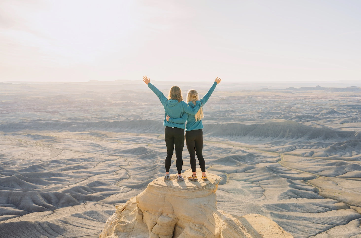 Two people wearing micro grid fleece hoodie for outdoors from Squak Mountain Co.